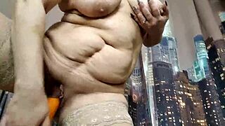 My slut shoves a carrot deep in her wet cunt