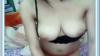 hey, check this asian amateur showing off her big tits solo.