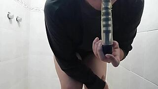 guy jerks off in bathroom with vibrator