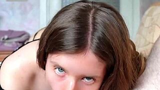 A petite girl gives a blowjob and rimjob, pushing her tongue deep inside his ass.