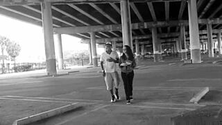 Pregnant slut daringly sucks huge black dick outside in Florida daylight.