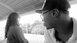 Amateur pregnant woman gets a facial with a black man outdoors