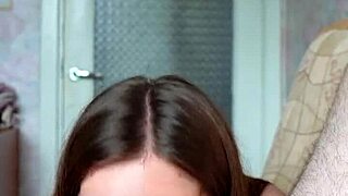 A petite girl gives a blowjob and rimjob, pushing her tongue deep inside his ass.