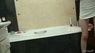 Tiny blonde Paula Z fingers her wet shaved pussy in the bathtub while craving more. She teases herself endlessly for pleasure.