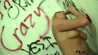 blonde amateur goes wild sucking a huge cock at the glory hole. mofozo com brings the raw action.