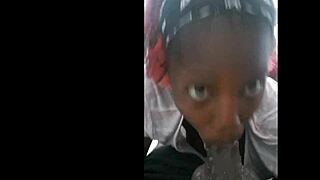 Close-up of a girl blowing and spitting cum bubbles