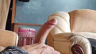 Masturbating cock in living room with panties and sniffing