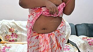 Leaked webcam video of Indian woman showing natural features.