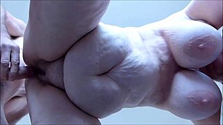 mature bbw amateur with huge tits gets drilled from behind hard.