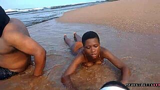 Specific Young black couple bangs hard on wet beach holiday