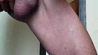 Muscular hunk has sex in front of the mirror