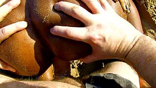 damn, this black milf gets slammed doggystyle on a beach, her stockings ripped, ass gaping from that monster cock!