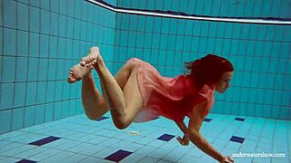 hot deniska strips underwater as naked teen in bikini