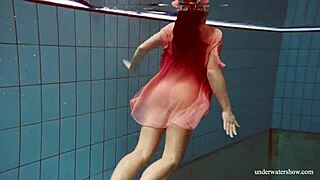 hot deniska strips underwater as naked teen in bikini