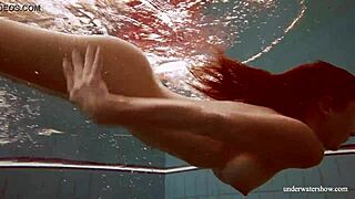 hot deniska strips underwater as naked teen in bikini