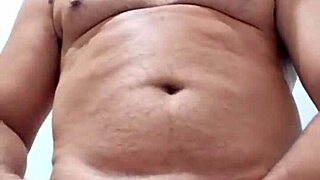 Yuri Gaúcho, Brazilian bear, delivers amateur handjob with massive cumload in solo.