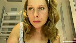 mom next door casually flaunts her fake tits for the neighbors.