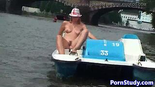 Public nude fetish eurobabe rides waterbike in outdoor setting
