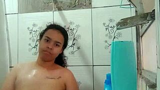 This brunette Latina pornstar is taking a bath and showing her wet pussy.