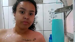 This brunette Latina pornstar is taking a bath and showing her wet pussy.