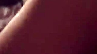 The horny wife eagerly rides her husband's cock in their homemade bedroom.