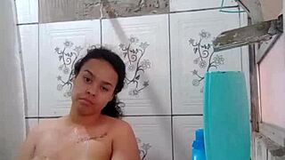 This brunette Latina pornstar is taking a bath and showing her wet pussy.