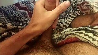 feeling the rush as moreno gostoso strokes his huge monster cock in the bedroom