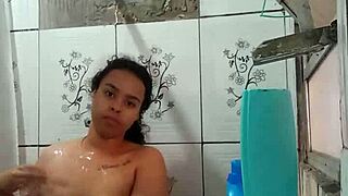 This brunette Latina pornstar is taking a bath and showing her wet pussy.