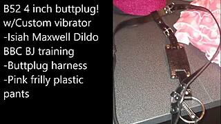 Sissy gets ready for extreme self-bondage with a massive black dildo.