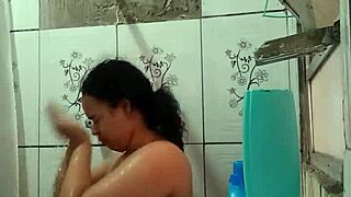This brunette Latina pornstar is taking a bath and showing her wet pussy.
