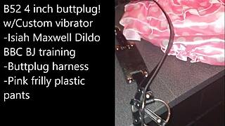 Sissy gets ready for extreme self-bondage with a massive black dildo.