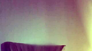 Random video in bed with saggy tits and hairy pussy