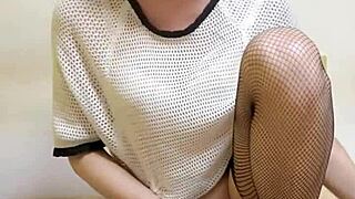 ting xuan in fishnets riding dildo to masturbate