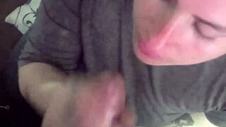 Before work, my girlfriend deepthroats my cock, swallowing with sloppy licks.