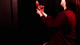 A student in uniform eagerly sucks cock at the gloryhole, swallowing every cumshot