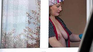 Naked milf in stockings washes window as taxi driver watches