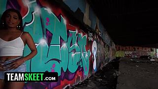 exotic art student gets her face painted on the street