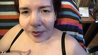 Mature sexy woman masturbates her big tits in this amateur video