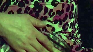 check out this milf shaking her big ass in fuschia leopard s2