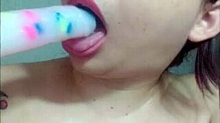 beautiful young girl teaches blowjob techniques with dildo and toys