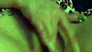 check out this milf shaking her big ass in fuschia leopard s2