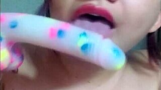 beautiful young girl teaches blowjob techniques with dildo and toys