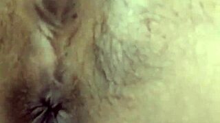 Pretty Indonesian girl fingers her tight swollen pussy