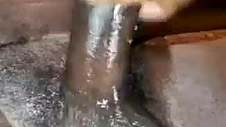 look at this big black dick getting jerked off in the bedroom