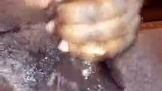 look at this big black dick getting jerked off in the bedroom