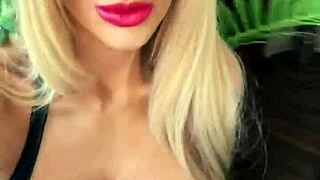 Woman Dominates in Wetlook Suit and Leather Boots Display