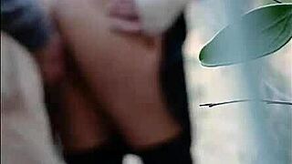 Hot woman receives spanks outdoors