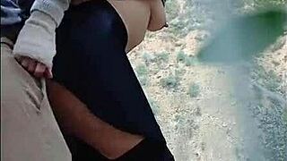 Hot woman receives spanks outdoors