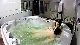 Young lesbian couple bathes naked and fingers to orgasm