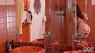 Why's this busty Spanish babe stroking so hard in shower?